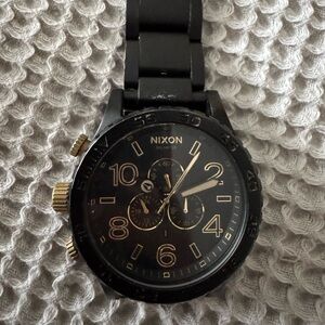 Nixon Black and Gold Watch
